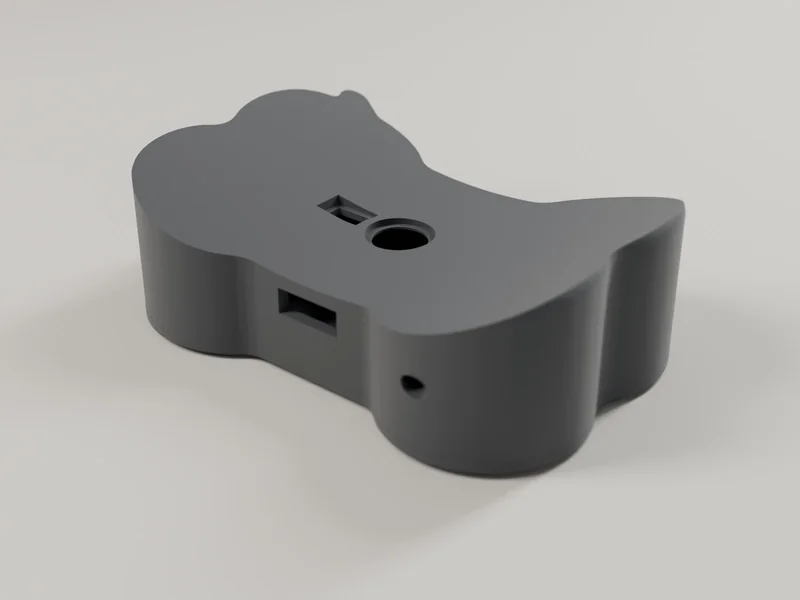 Render of the underside of the Bark Tag: a curved face with a small round sensor window.